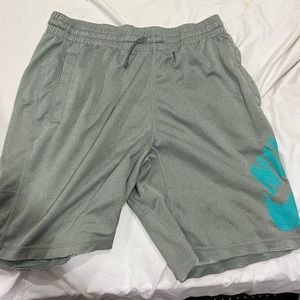 Gray and blue Nike athletic shorts